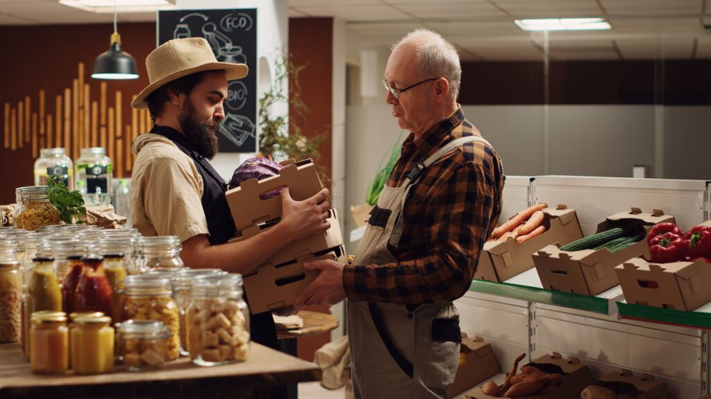Senior using vouchers at a farmers’ market, exploring how can senior citizens get free money locally.